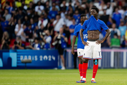 Soungoutou Magassa of France looks dejected