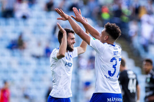 IFK Norrköpings Laorent Shabani och Moutaz Neffati jublar