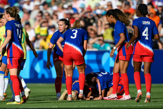 Lindsey Horan of USA in pain in the women’s football