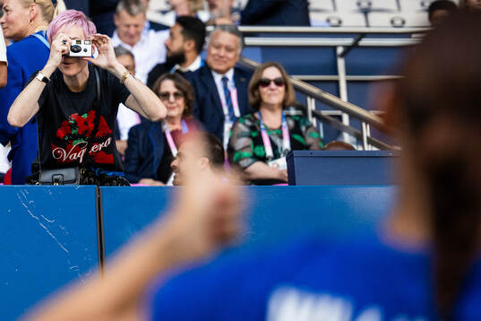 Former player Megan Rapinoe in the stands