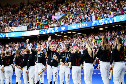 Players of Germany celebrate with their bronze medals
