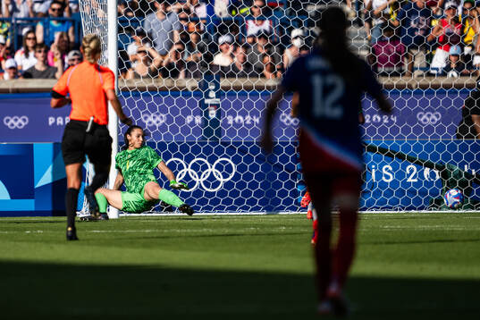 Goalkeeper Lorena of Brazil sees the ball go in for 0-1 in