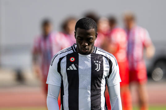 Timothy Weah of Juventus looks dejected