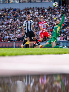 Federico Gatti and goalkeeper Michele Di Gregorio of