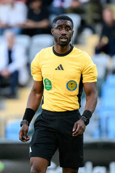 Domare Fredrik Oppong