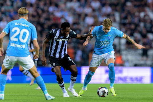 Abdul Rahman Baba of PAOK and Søren Rieks of Malmö FF