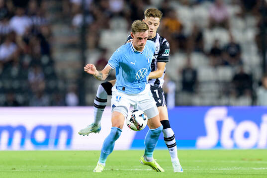 Søren Rieks of Malmö FF and Ioannis Konstantelias of PAOK