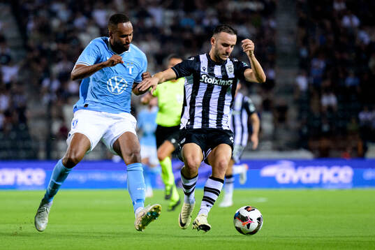 Isaac Kiese Thelin of Malmö FF and Joan Sastre of PAOK