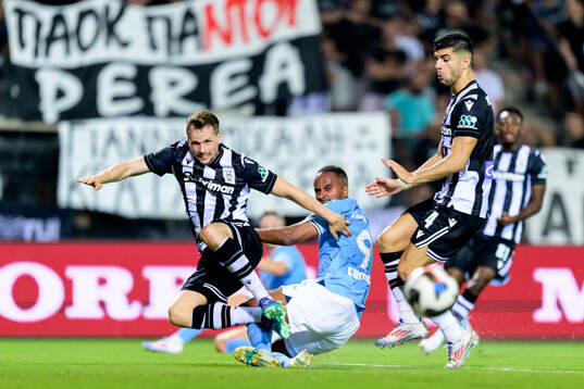 Thomas Murg och Konstantinos Koulierakis of PAOK against