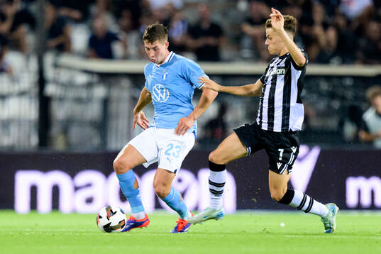 Lasse Berg Johnsen of Malmö FF and Ioannis Konstantelias