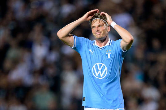 Jens Stryger Larsen of Malmö FF looks dejected