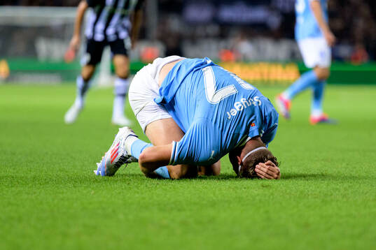 Jens Stryger Larsen of Malmö FF in pain