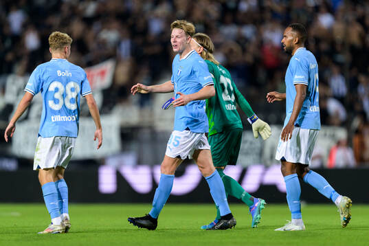 Nils Zätterström of Malmö FF celebrates with team mates