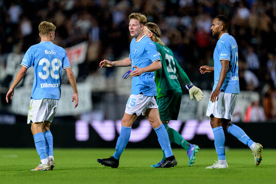 Nils Zätterström of Malmö FF celebrates with team mates