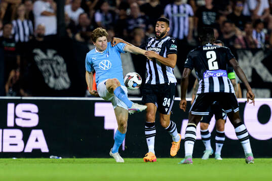 Oliver Berg of Malmö FF and Tarik Tissoudali of PAOK