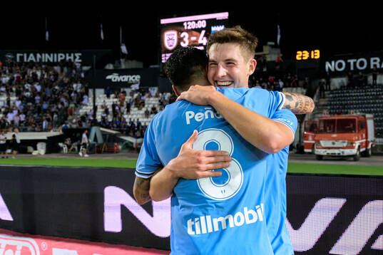 Lasse Berg Johnsen of Malmö FF celebrates with Sergio Pena