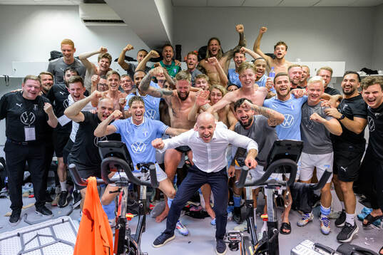 Players of Malmö FF celebrates in the looker room