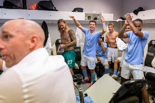 Players of Malmö FF celebrates in the looker room