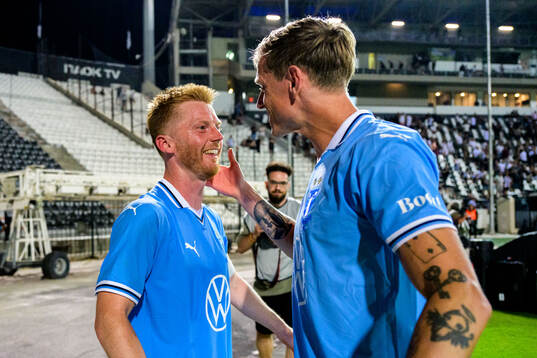 Anders Christiansen and Søren Rieks of Malmö FF celebrate