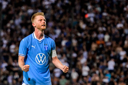 Anders Christiansen of Malmö FF celebrates scoring 3-4