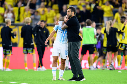 Lindon Selahi and coach Radomir Dalović of Rijeka
