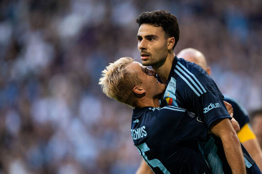 Deniz Hummet of Djurgården celebrates with Oskar Fallenius