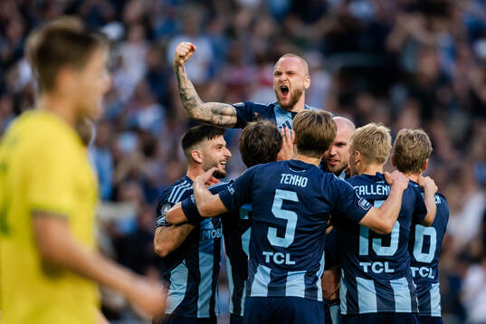 Players of Djurgården celebrate the 3-1 goal by Adam Ståhl
