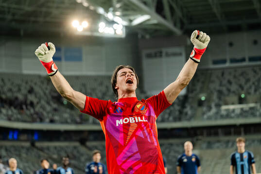 Goalkeeper Jacob Zetterström of Djurgården celebrates