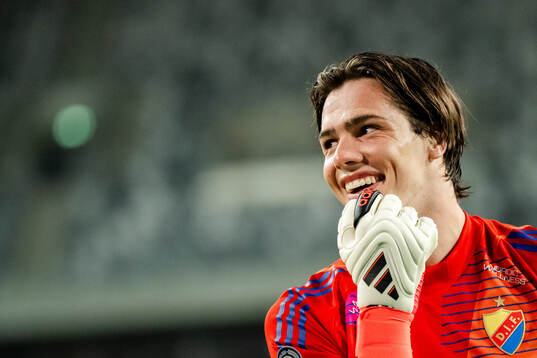 Goalkeeper Jacob Zetterström of Djurgården celebrates
