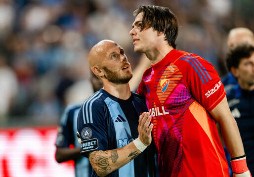 Magnus Eriksson and goalkeeper Jacob Zetterström of