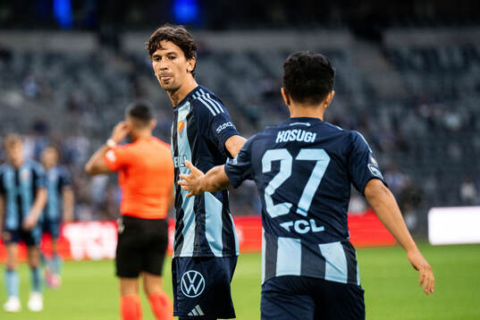 Gustav Wikheim and Keita Kosugi of Djurgården celebrate