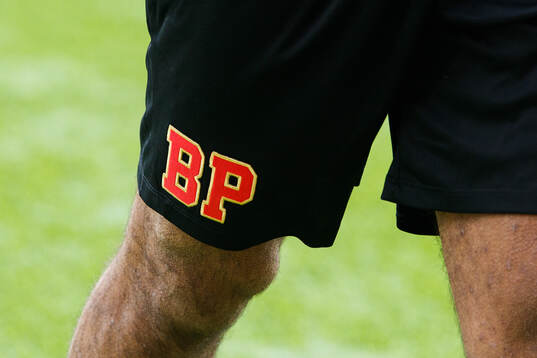 Brommapojkarnas emblem på ett par shorts innan