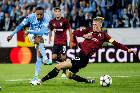 Isaac Kiese Thelin of Malmö FF and Filip Panak of Sparta