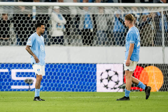 Sergio Pena and Nils Zetterström of Malmö FF look dejected