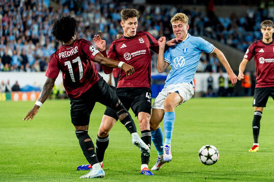 Angelo Preciado and Martin Vitik of Sparta Prag and Hugo