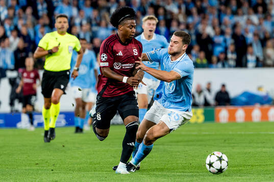 Asger Sørensen of Sparta Prag and Gabriel Busanello of