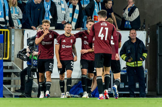 Lukas Haraslin of Sparta Prag celebrate with teammates