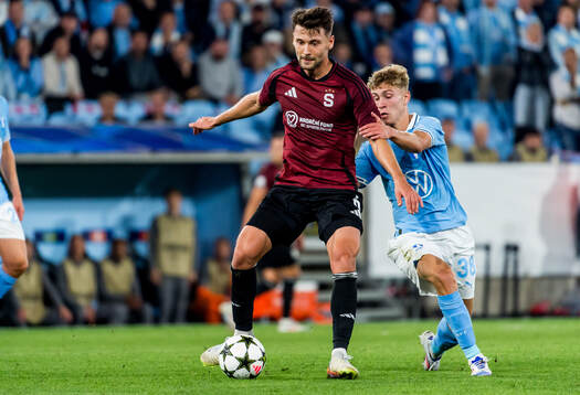 Kaan Kairinen of Sparta Prag and Hugo Bolin of Malmö FF