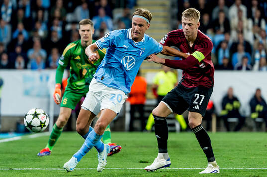 Otto Rosengren of Malmö FF and Victor Olatunji of Sparta
