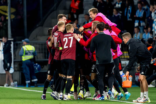 Matej Rynes of Sparta Prag celebrate with teammates