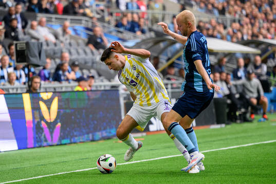 Marko Božic of Maribor and Peter Therkildsen of Djurgården