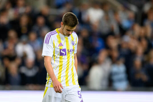 Lan Vidmar of Maribor looks dejected
