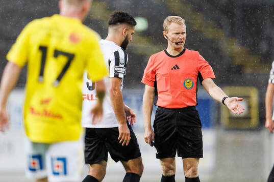 Domare Fredrik Klitte