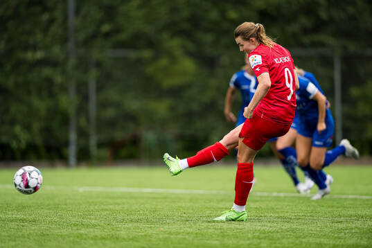 Julie Elise Hoff Klæboe of Røa scores the 1-0 goal