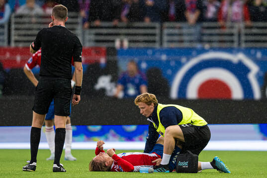 Ole Breistøl of Lyn with an injury