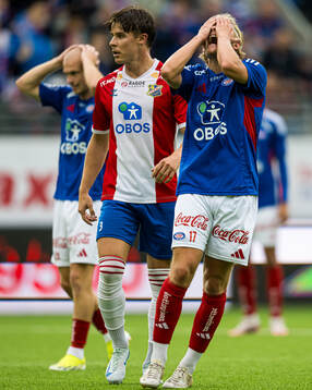 Carl Lange of Vålerenga looks dejected