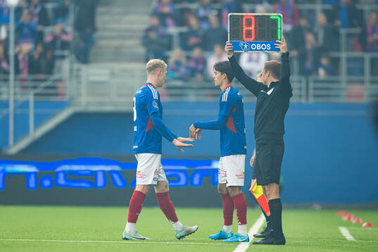 Henrik Bjørdal and Magnus Riisnæs of Vålerenga