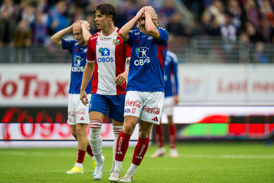 Carl Lange of Vålerenga looks dejected