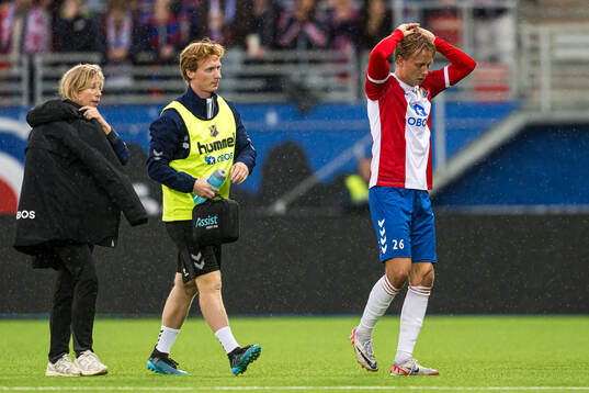 Ole Breistøl of Lyn with an injury