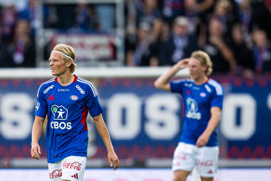 Carl Lange of Vålerenga looks dejected